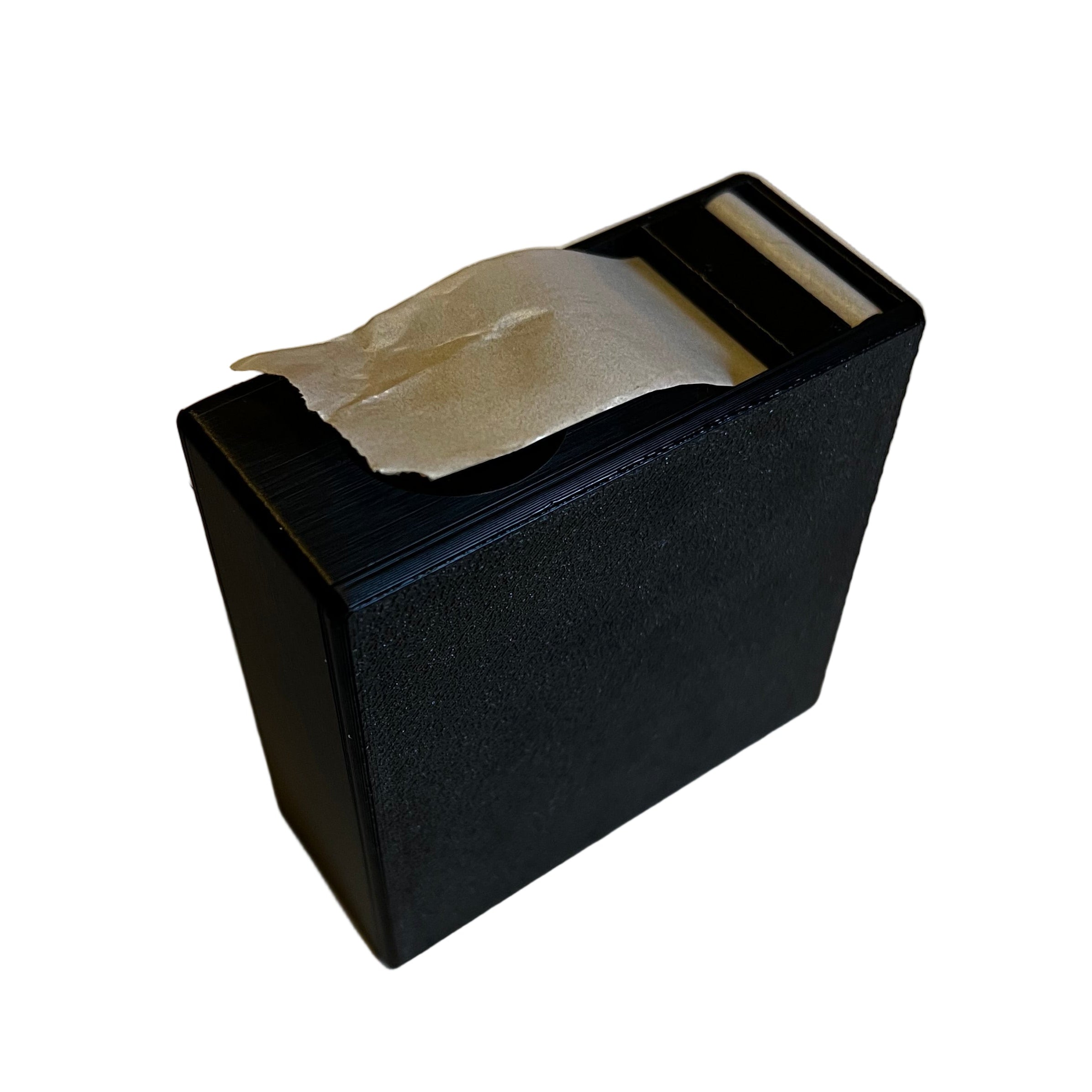 Black tape dispenser with a roll of tape on a white background
